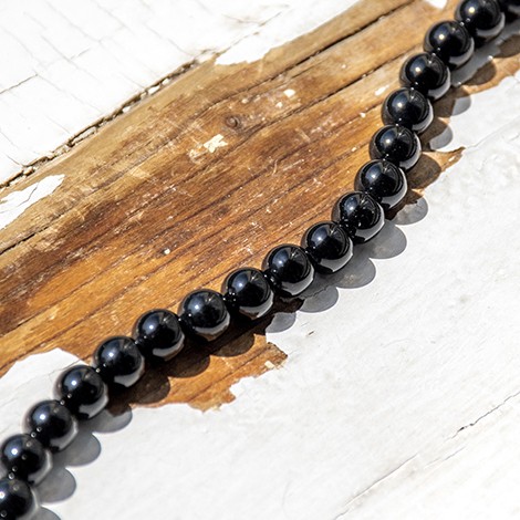 oniks, oniks kristal, oniks perle, kristali za ustvarjanje, perle iz kristalov, kristal za zaščito