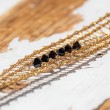 lace bracelet,golden with black crystals